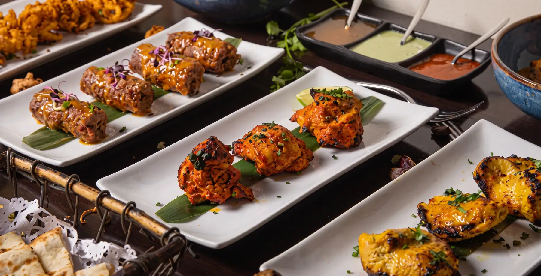 Grilled skewers with dipping sauces, served at Swahili Coast Villas